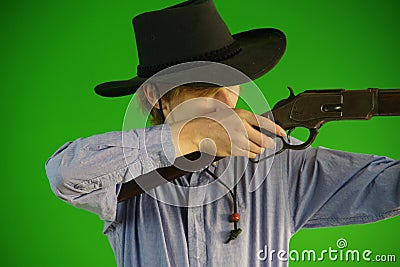 Young Cowboy with 1866 Winchester Rifle Stock Photo