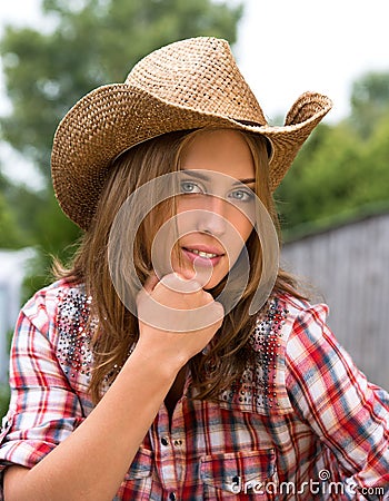 Young cowgirl in hat Stock Photo
