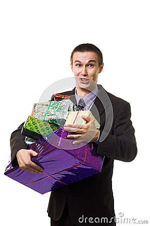 Young crazy man with many presents Stock Photo
