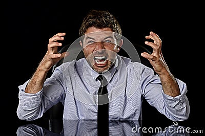 Young crazy stressed businessman in worried tired face expression screaming desperate Stock Photo