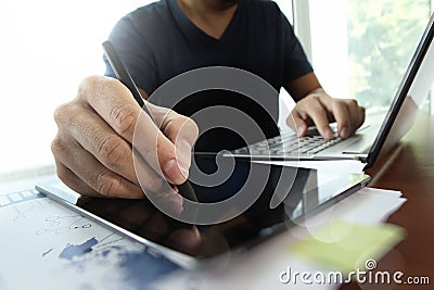 Young creative designer man working at office Stock Photo