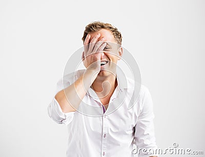 Young creative man having duh moment Stock Photo