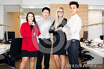 Young Creative Team In Their Office Stock Photo