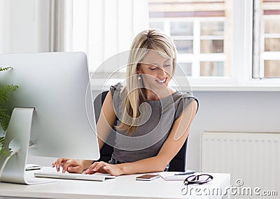 Young creative woman working with computer Stock Photo