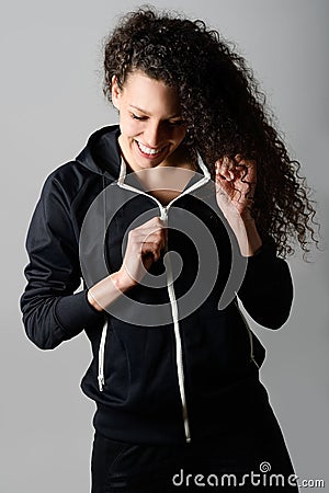 Young cute female in track suit Stock Photo