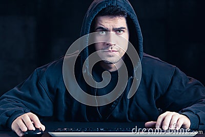 Young cyber warior in hoody Stock Photo