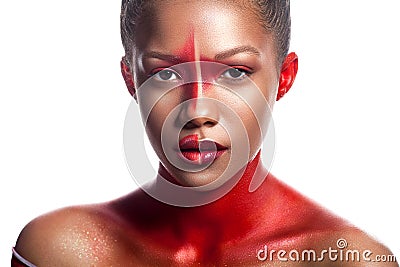 Young dark-skinned girl with abstract asymmetric red make-up Stock Photo