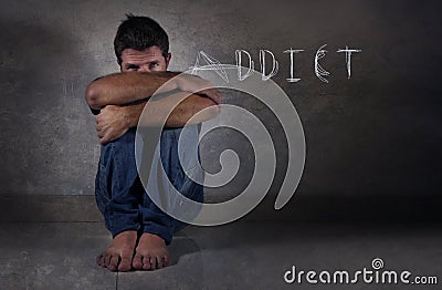 Young depressed man suffering depression in drug gambling internet and alcohol addiction problem concept Stock Photo