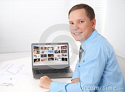 Young designer working with some images Stock Photo