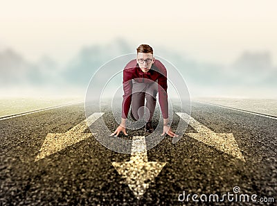 Businessman kneeling in ready position Stock Photo