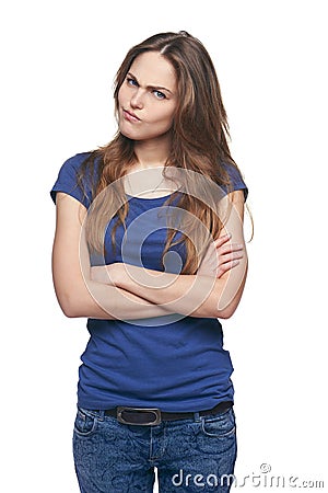 Young discontent girl with folded hands Stock Photo