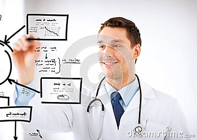 Young doctor working with something imaginary Stock Photo