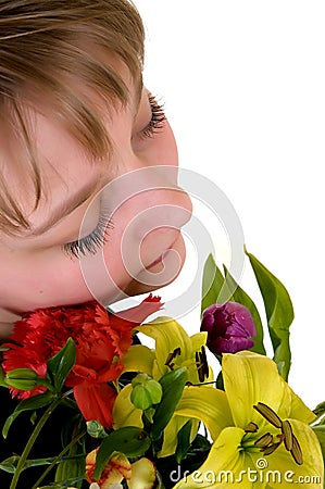 Young dreamy teenager girl with flowers Stock Photo