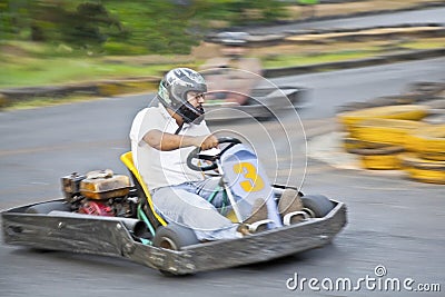 Young driver Go Kart left hand bend Stock Photo