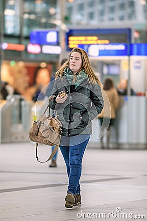 Young Dutch woman at Utrecht Central Station, Netherlands Editorial Stock Photo