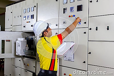 Young electrician at work Stock Photo