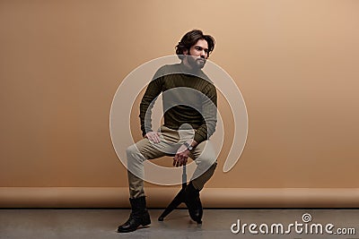 Young elegant man in studio Stock Photo