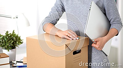 A young employee of the office is ready to move Stock Photo