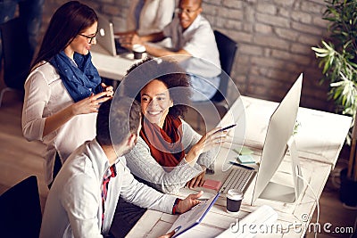 Young employees in office Stock Photo