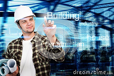 Young engineer,Architect,businessman pointing at building and construction concept Stock Photo