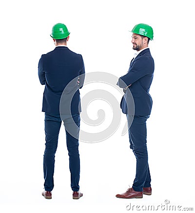 Young engineer in suit and helmet back and rear view isolated Stock Photo
