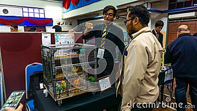 Young engineering student presenting his product at the Final Year Project exhibition event in UniKL MFI Editorial Stock Photo