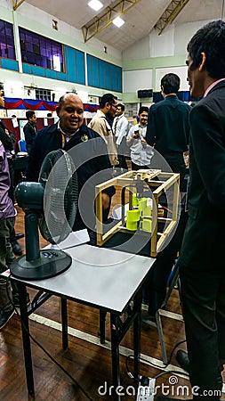 Young engineering student presenting his product at the Final Year Project exhibition event in UniKL MFI Editorial Stock Photo