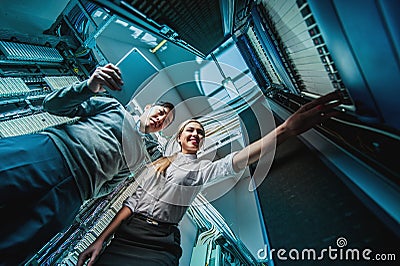 Young engineers businessmen in server room Stock Photo