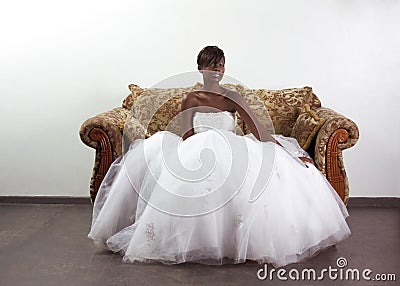 Young ethnic black woman bride in wedding dress Stock Photo