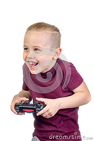 Young excited handsome caucasian boy plays computer games with joystick Stock Photo