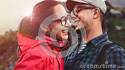 Young Couple Hikers Laugh And Enjoy Vacation Stock Photo