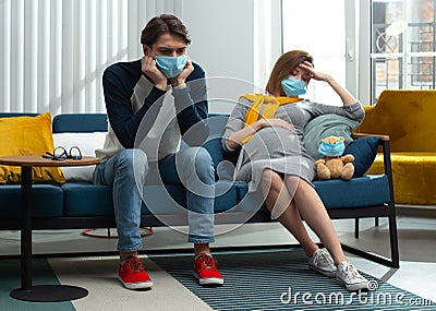 Young family facing difficulties during the COVID-19 quarantine Stock Photo