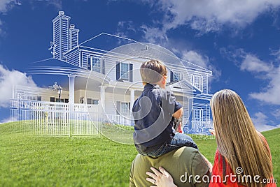 Young Family Facing Ghosted House Drawing Behind Stock Photo