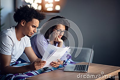 Young family having debt problems, not able to pay out their loan. Stock Photo