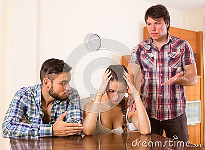 Young family having about domestic quarrel Stock Photo