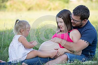 Young family with kids having picnic outdoors. Stock Photo