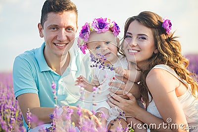 Young family in a lavender field Stock Photo