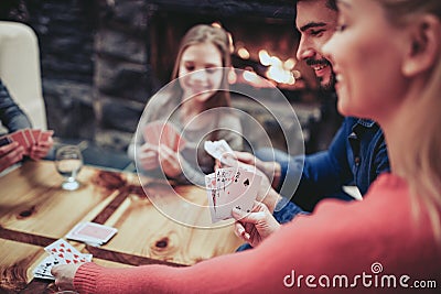 Young family playing card game Stock Photo