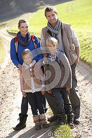 Young family posing in park Stock Photo