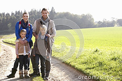 Young family posing in park Stock Photo