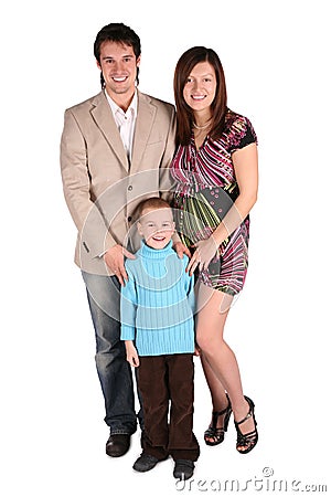 Young family posing, pregnant mother Stock Photo