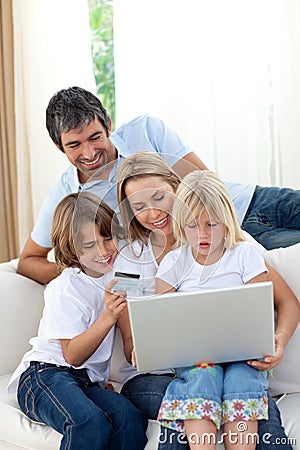 Young family shopping online Stock Photo