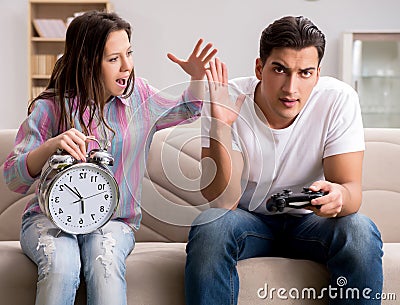 Young family suffering from computer games addiction Stock Photo