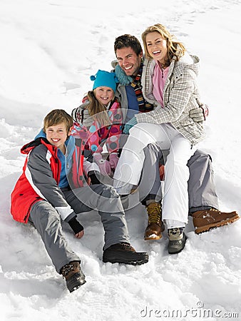 Young Family On Winter Vacation Stock Photo