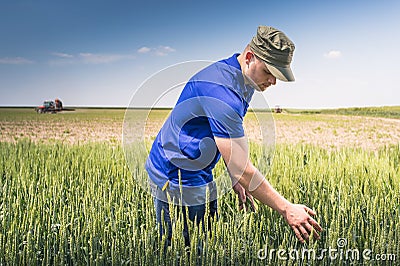 Young farmer in a field Stock Photo