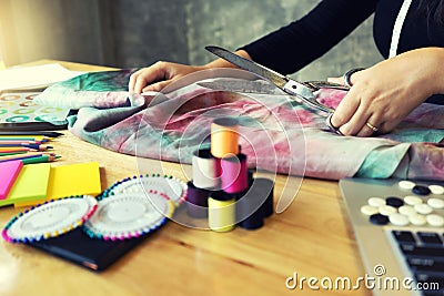 young fashion designer work with fabric Stock Photo