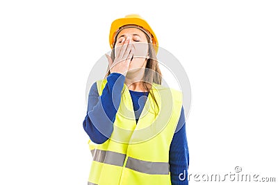 Young female engineer or architect yawning Stock Photo