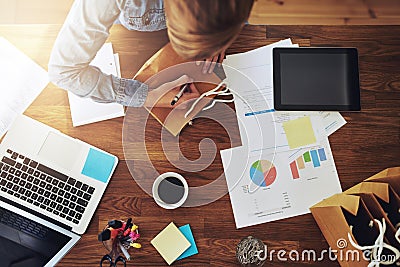 Young female entrepreneur working in a home office Stock Photo