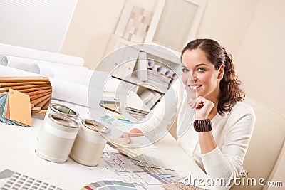 Young female interior designer at office Stock Photo
