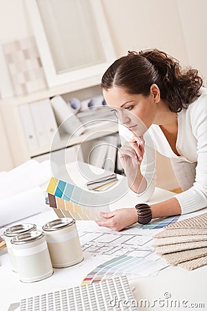 Young female interior designer at office Stock Photo